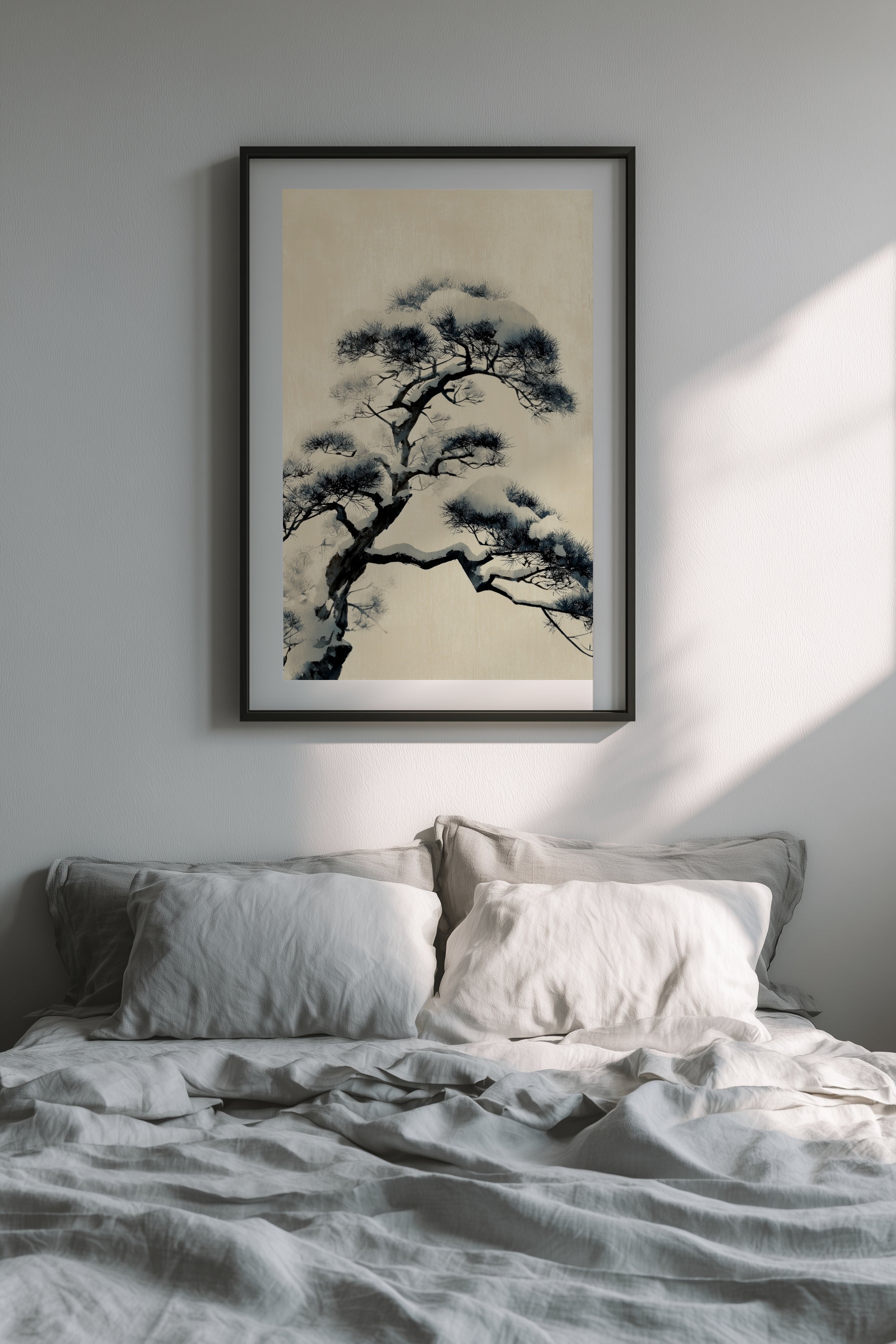 Japanese ink pine painting framed in a minimalist bedroom